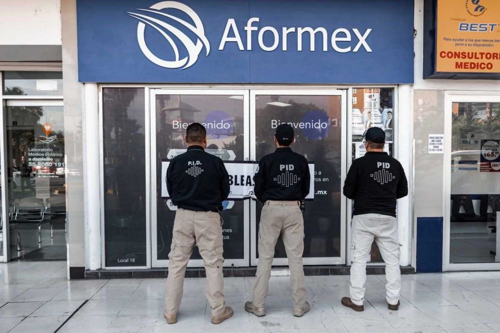 Cateo en inmueble vinculado a financiera acusada de fraude. El operativo asegur\u00f3 documentos y expedientes.