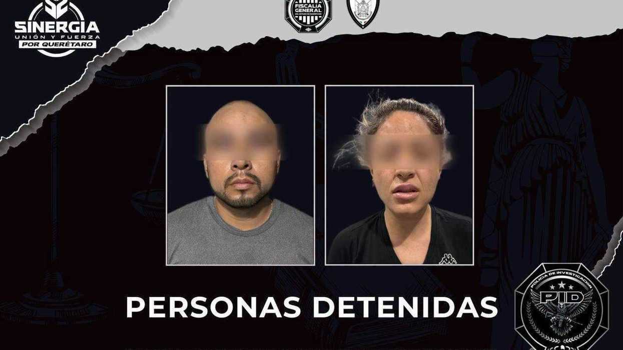 Elementos de la Fiscalía General de Querétaro durante un operativo en el que fueron detenidas dos personas investigadas por un homicidio ocurrido en la colonia Lázaro Cárdenas.