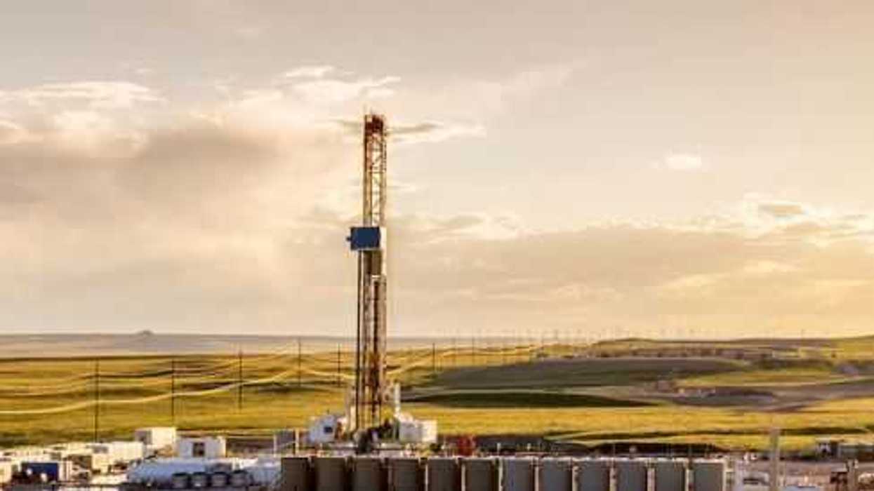 Fracking Fracking Drill Rig on the Prairie at Dusk