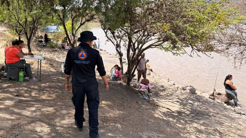 Semana Santa Quer\u00e9taro: familias en cuerpo de agua vigilado por Protecci\u00f3n Civil municipal durante operativo vacacional