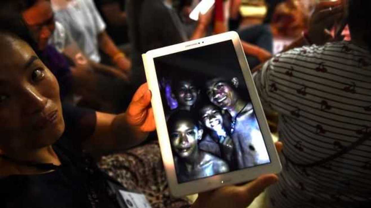 TOPSHOT-CORRECTION-THAILAND-ACCIDENT-WEATHER-CHILDREN-CAVE